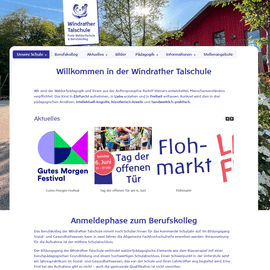 Willkommen bei der Windrader Talsschule mit buntem Logo und Schulgebäude im Hintergrund.